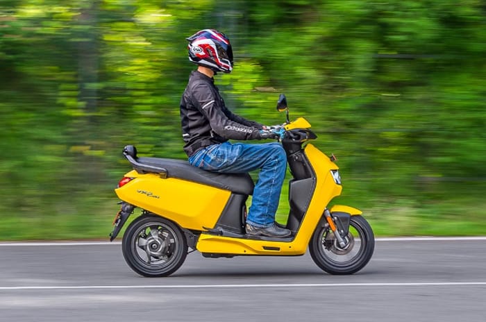 Vida VX2 right side profile riding shot